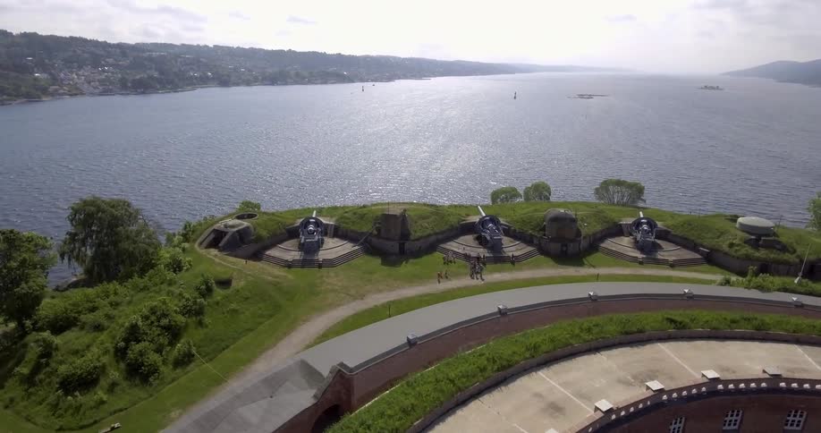 A building next to a large body of water
