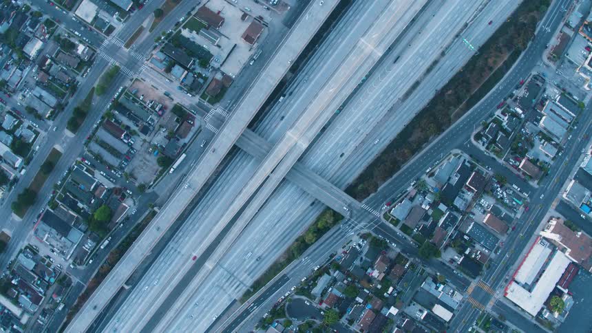Aerial view of traffic running over the highway on the city