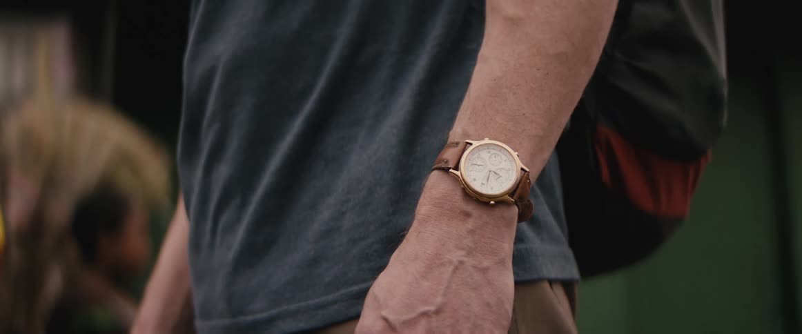 A close up of a man wearing a watch