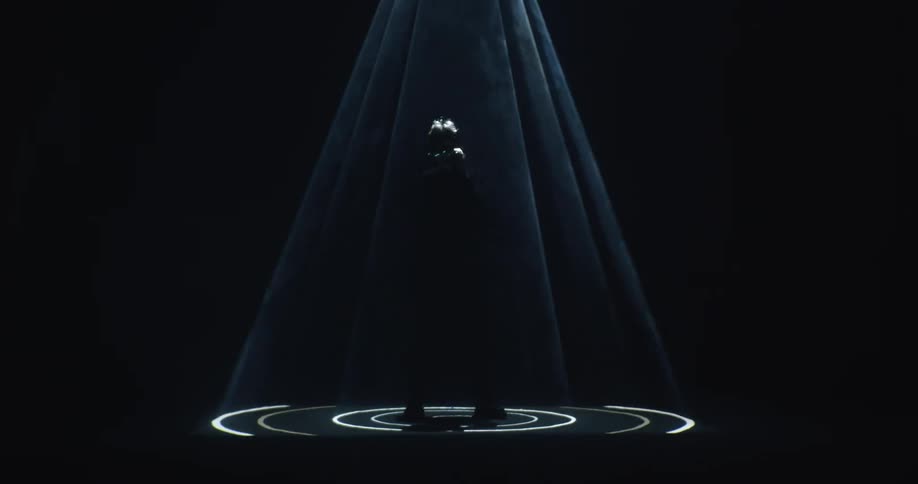 A dancer under a spotlight