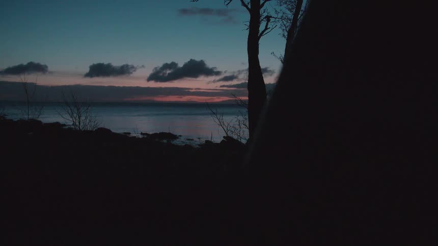 A body of water at dusk