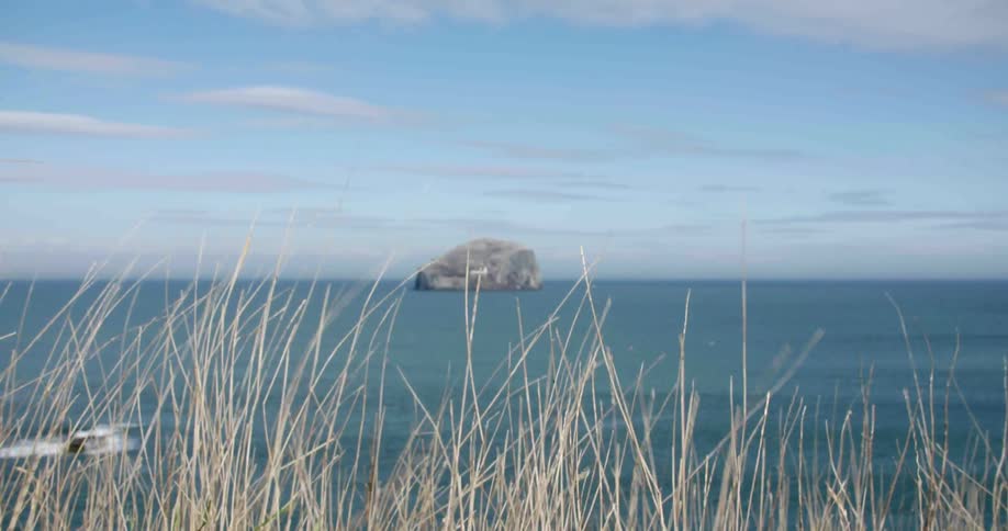A large rock formation in the ocean