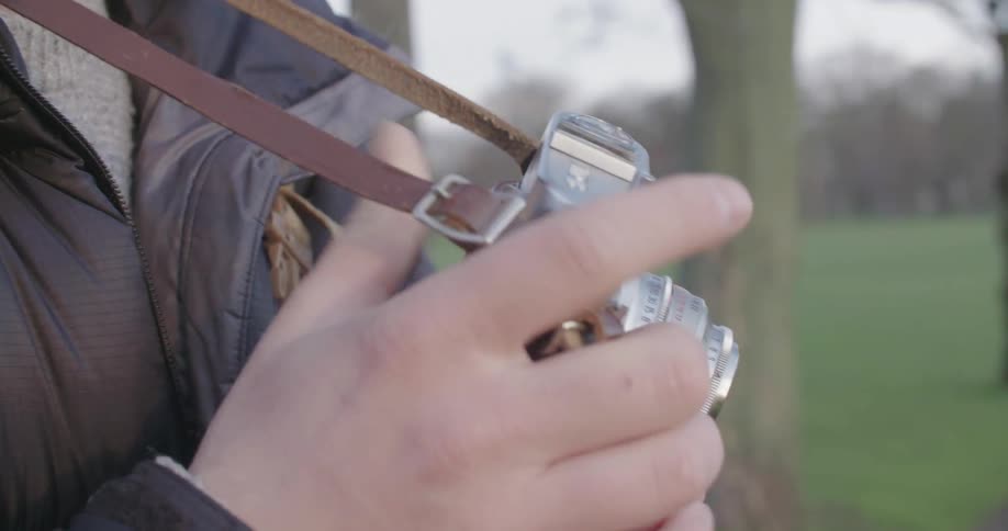 Person holding a camera
