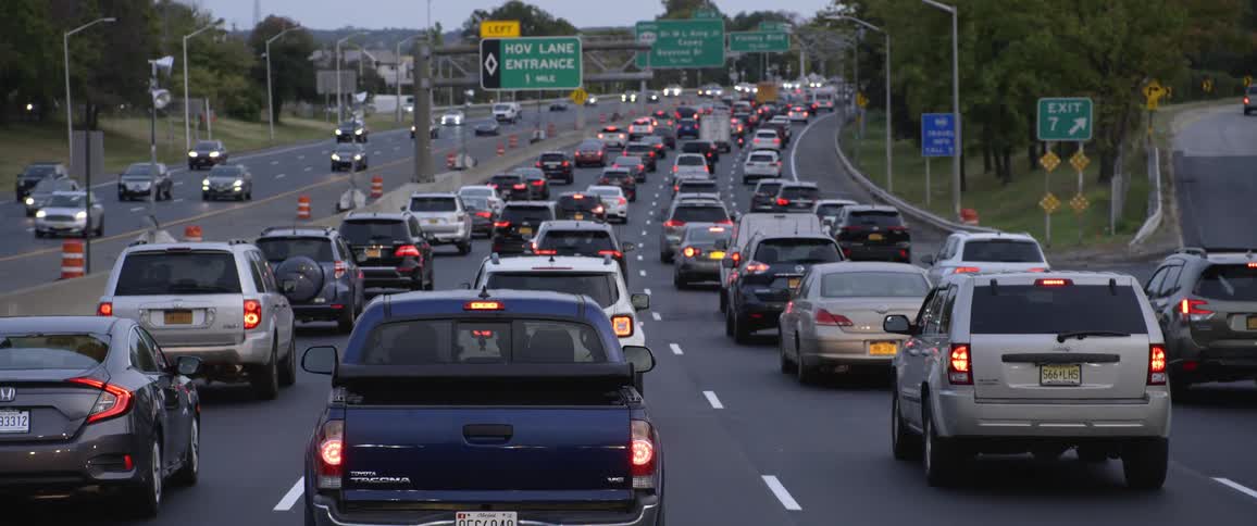 Cars are stuck in a traffic jam on an 8 lane highway