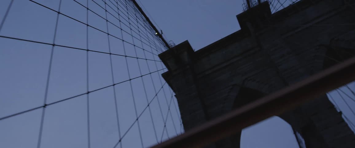 The brooklyn bridge hybrid cablestayed suspension bridge in new york city at evening