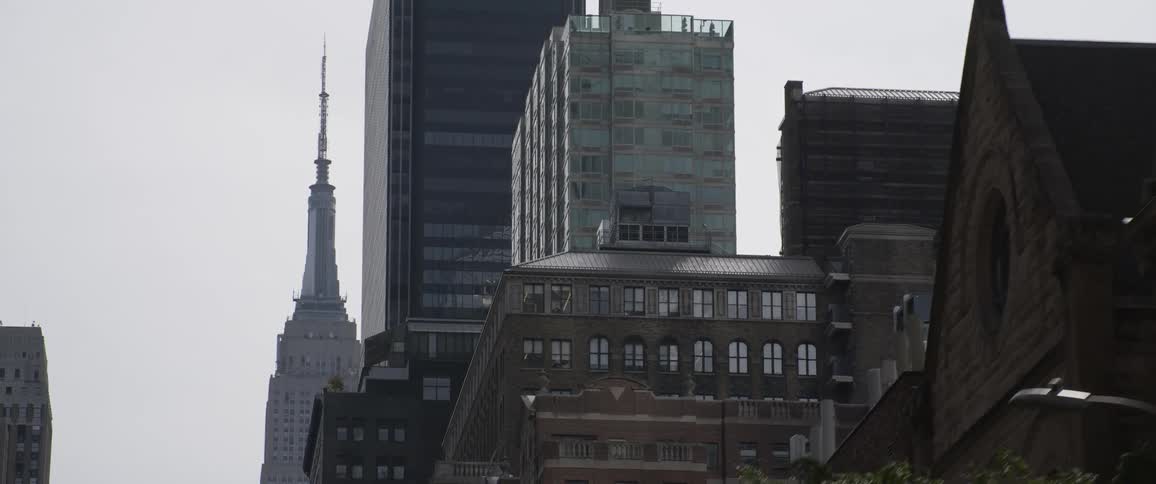 Tall skyscrapers in the citys downtown skyline at day time