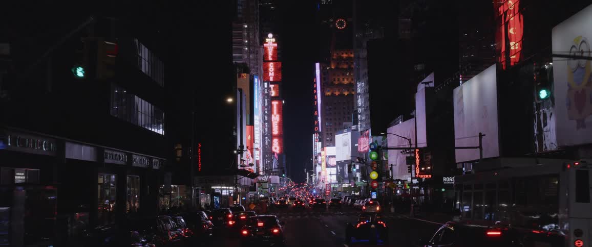 A wide shot of a busy city street