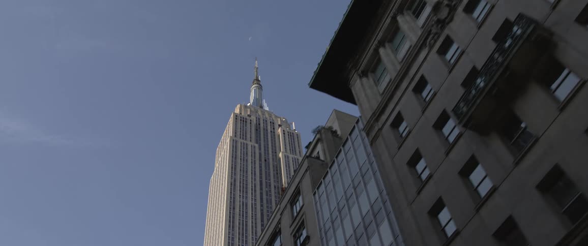 Tall skyscrapers towering overhead on a clear day