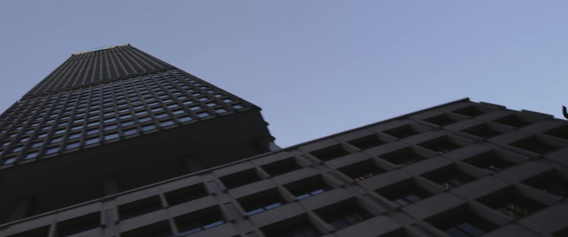 Building in downtown tower block is decorated with metal pipes