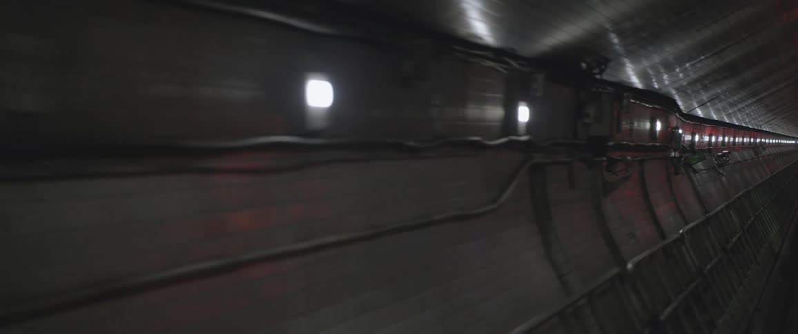 A train track in a tunnel