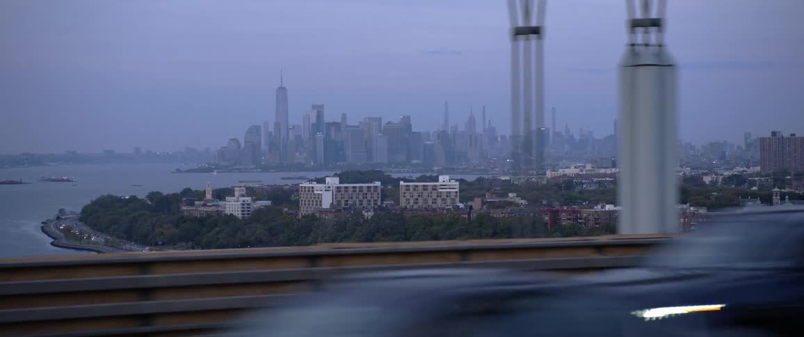 Skyline of new york city filmed from a moving car at morning