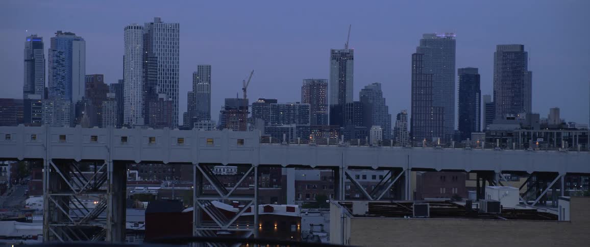 The sun is rising in the city