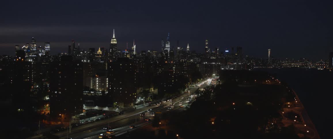 Aerial view of downtown city at night is displayed