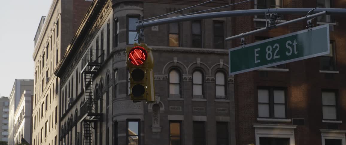 Street light hanging over a street in the citys downtown at morning