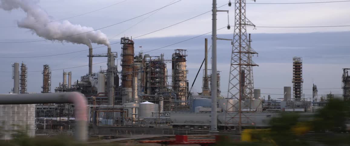 Smoke billowing out of a power plant
