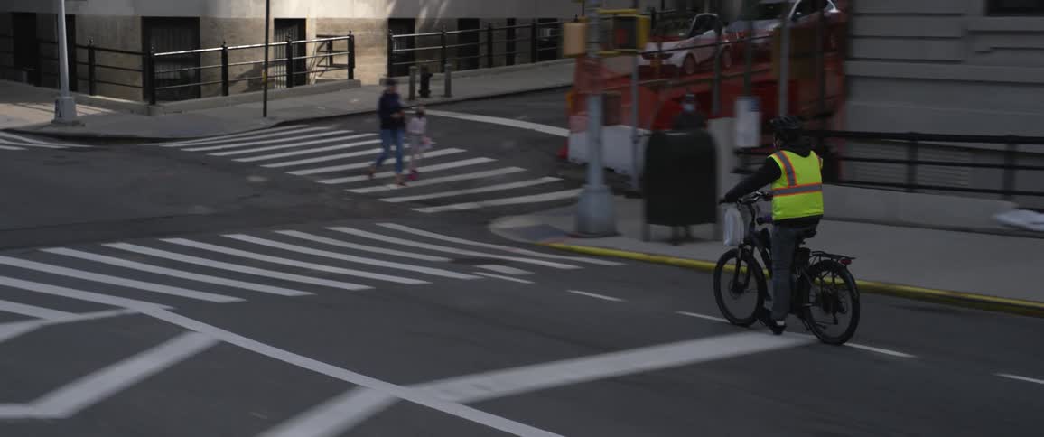 A shot following a bike in a city