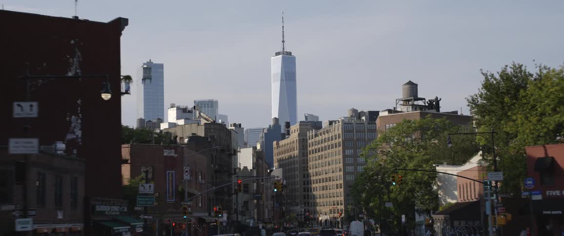 Dramatic zoom of the one world trade center in lower manhattan at morning