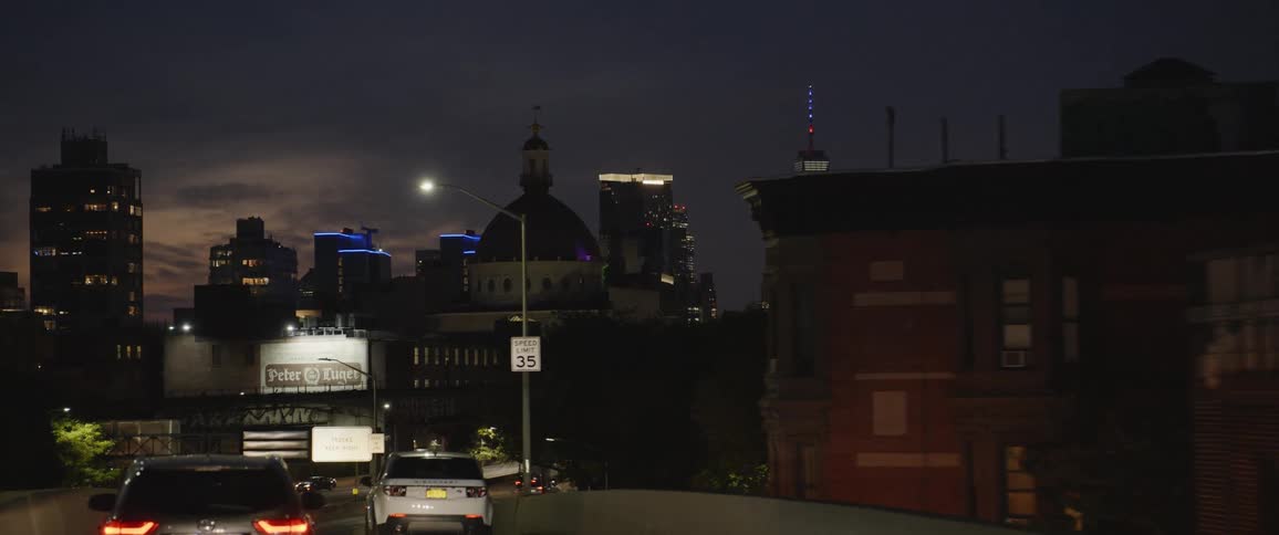 A shot showing off a large city from a highway