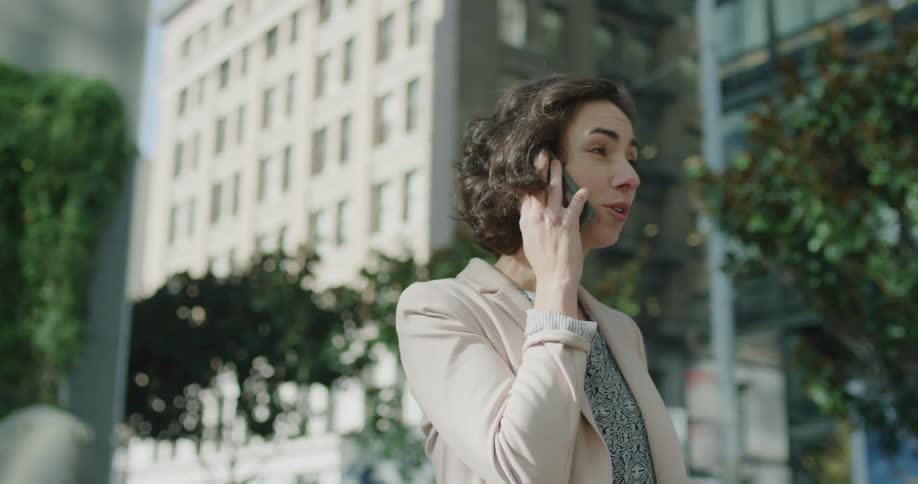 A woman talking on a cell phone