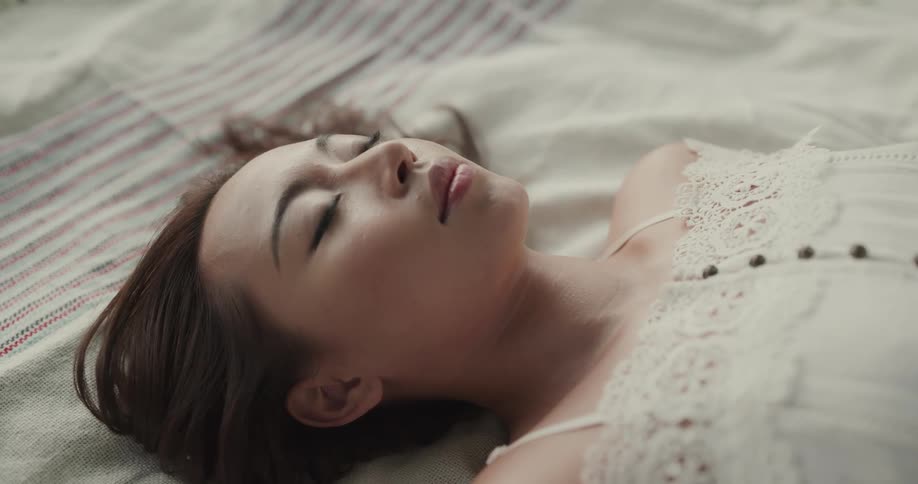 A woman laying in a bed