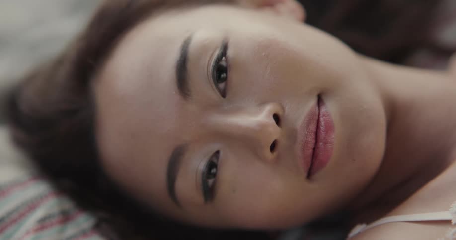 A woman laying in a bed