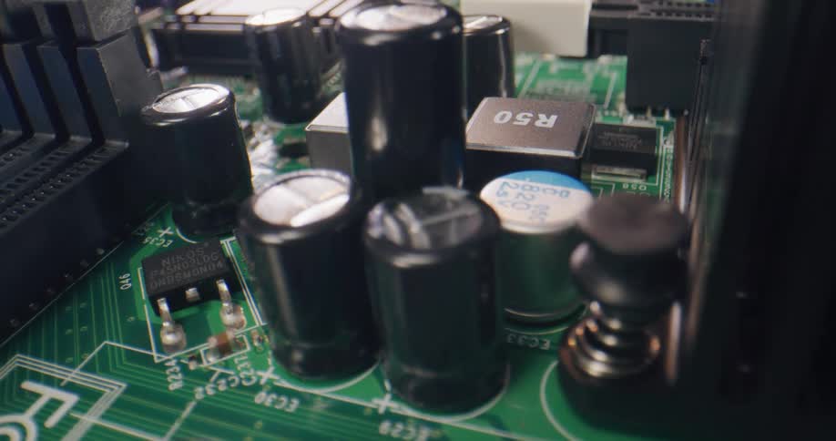 Extreme close up reveal of internal computer motherboard and components