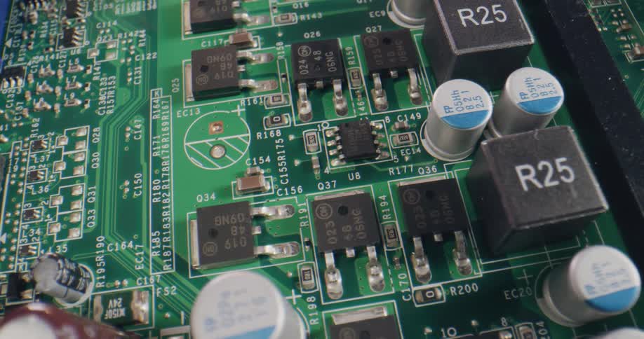 A computer motherboard with capacitors and microchips