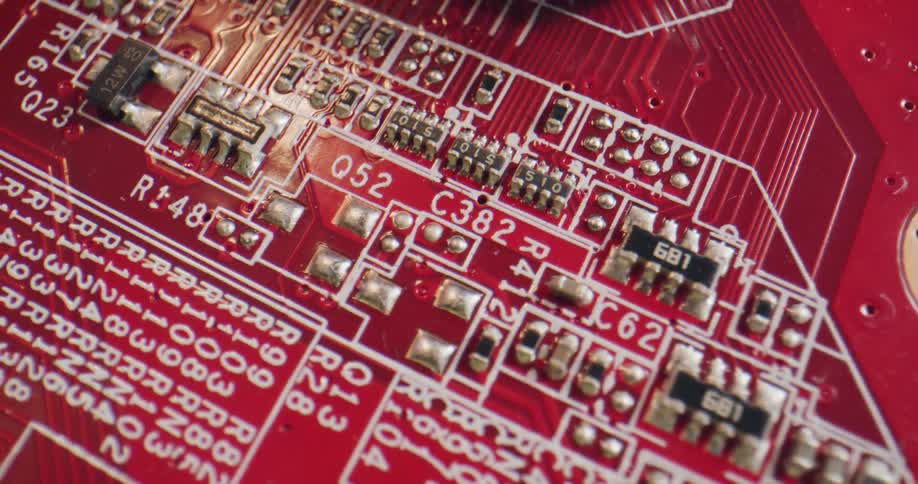 Red circuit board is labeled in white