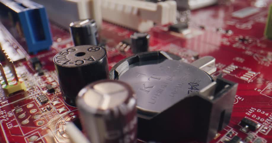 Electronics board with circuitry and slots