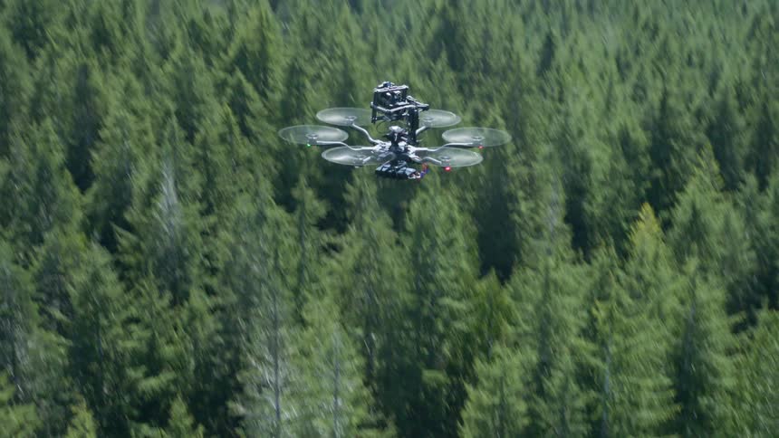 A drone ascends high from its navigation route out of frame into the sky