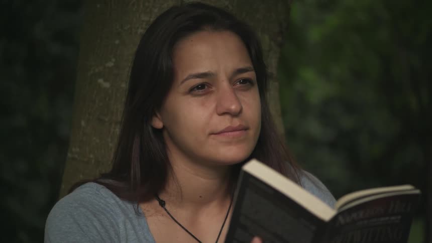 A woman reads a book