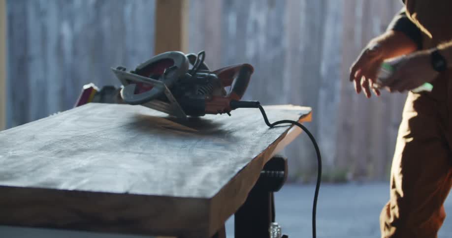 A man preparing to work with power tools