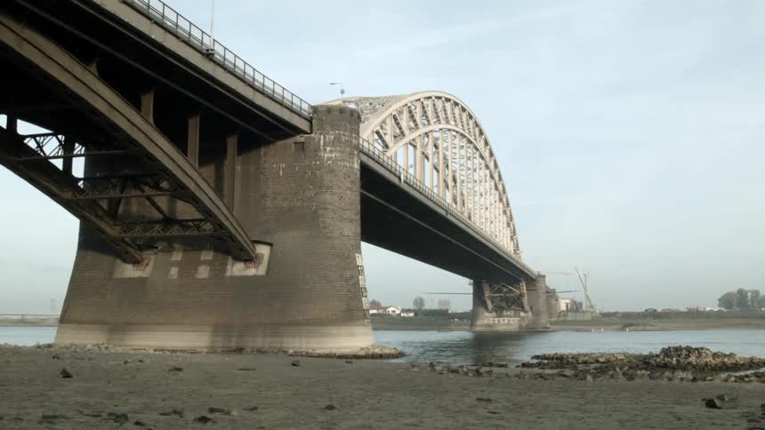 A panning shot of a large bridge