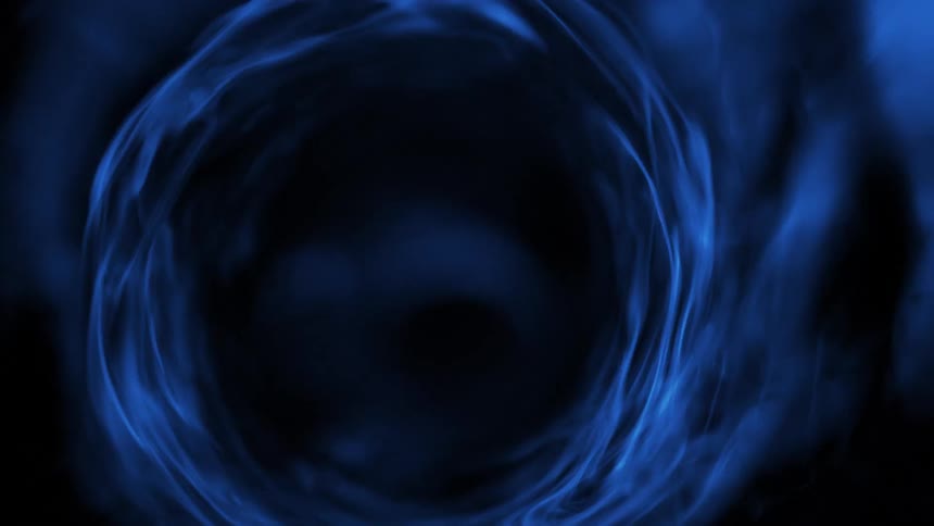 Swirling vortex of a liquid bright electric blue whirlpool