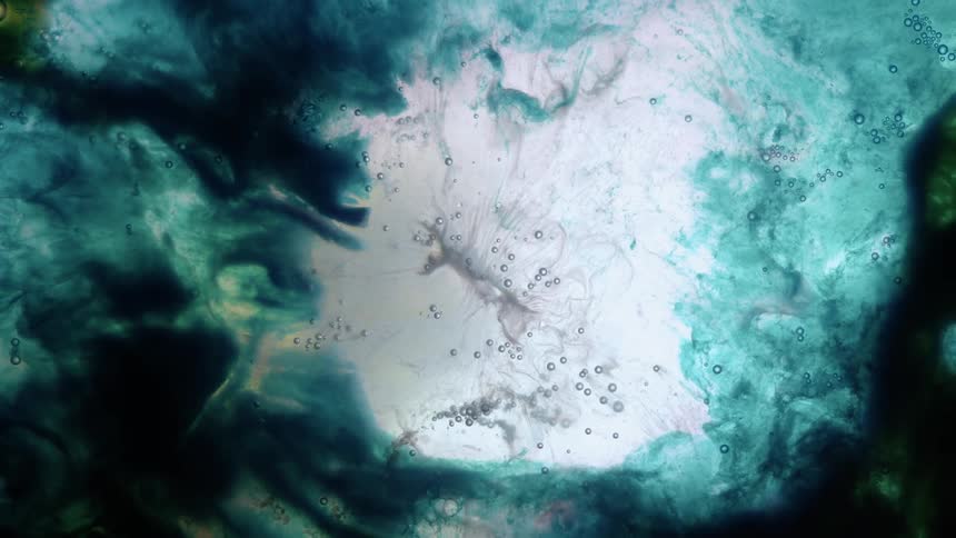 A close up of liquids mixing
