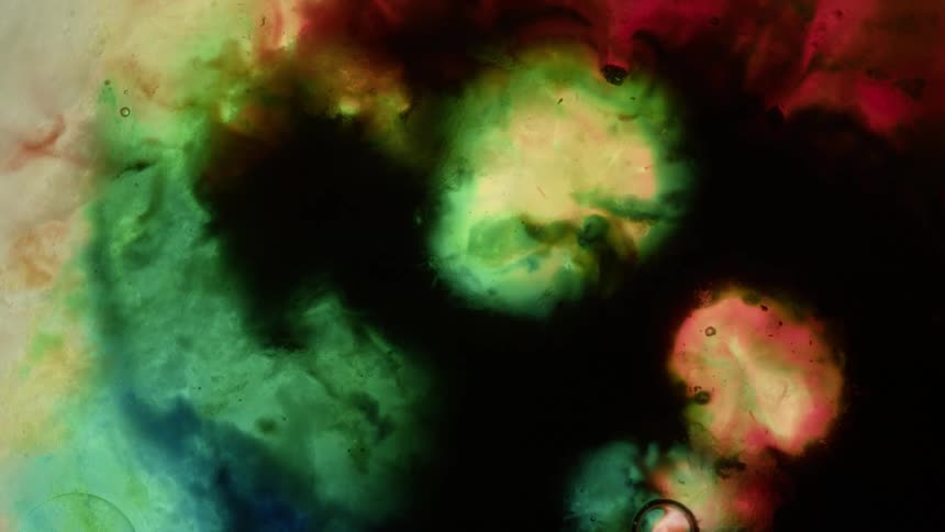 The different color liquids mix together