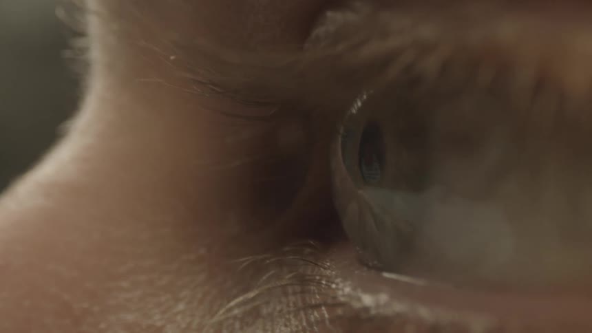 A person flutters their eyelid