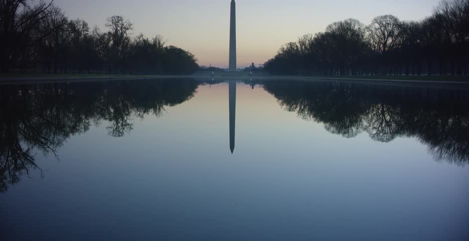 The Washington Monument over foggy reflecting pool at the National Mall