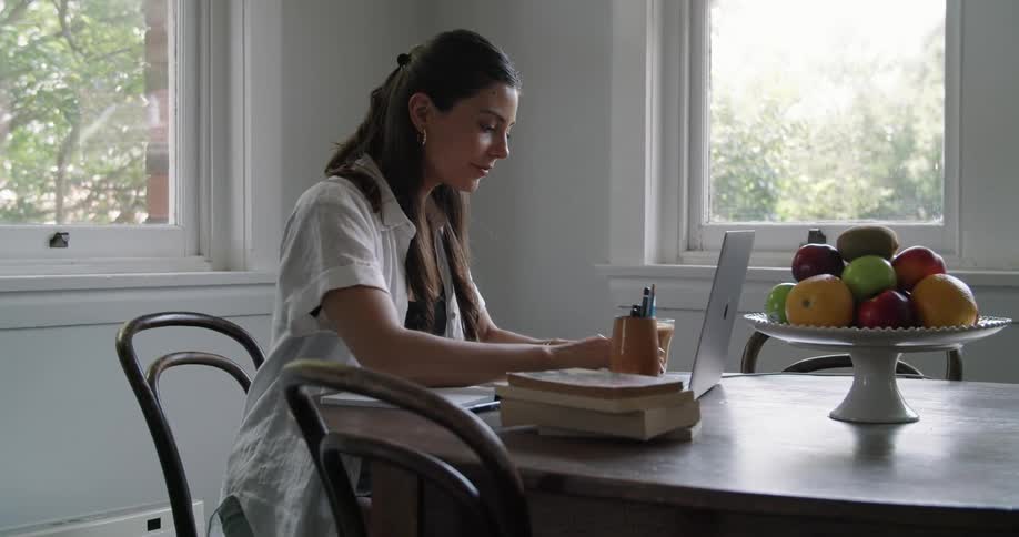 Woman writing and reading