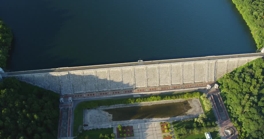 Aerial view of the calm waters of a lake in a dam at morning