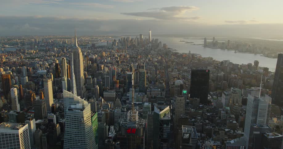 Aerial view of the skyscrapers in manhattans downtown skyline at sunset