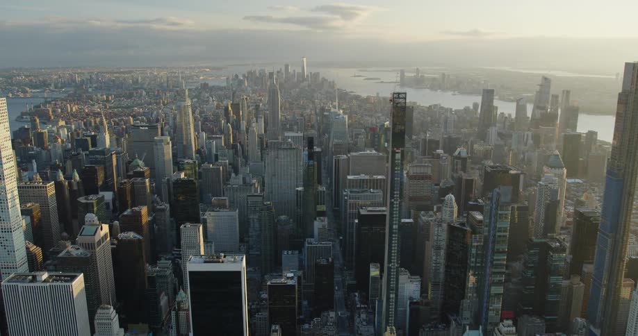 A city with many buildings against bodies of water