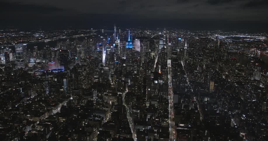 Aerial view of the tall skyscrapers on manhattans downtown skyline at night