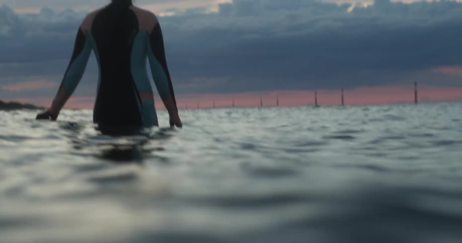 A woman standing in a body of water