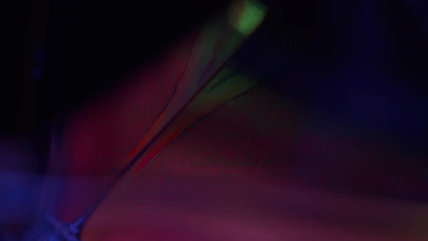 Liquid dye mixes together in abstract art