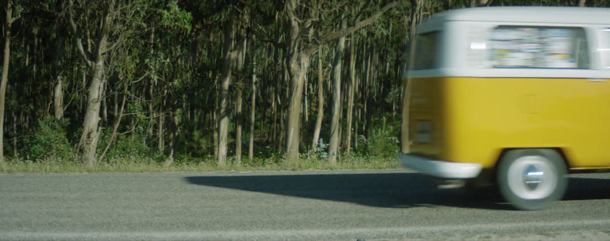 Camper van driving on road