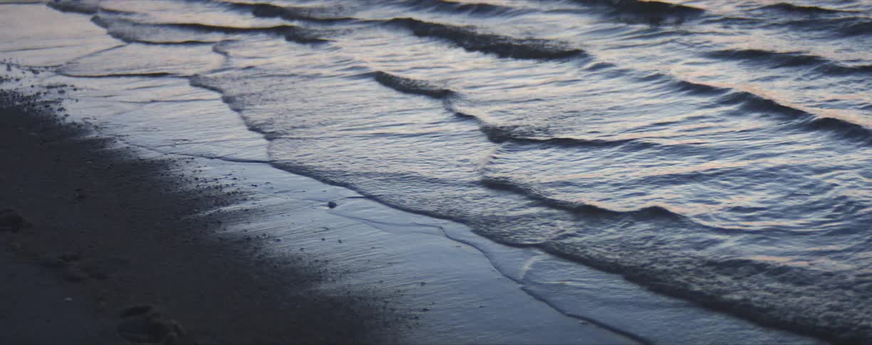 Waves rolling in over beach