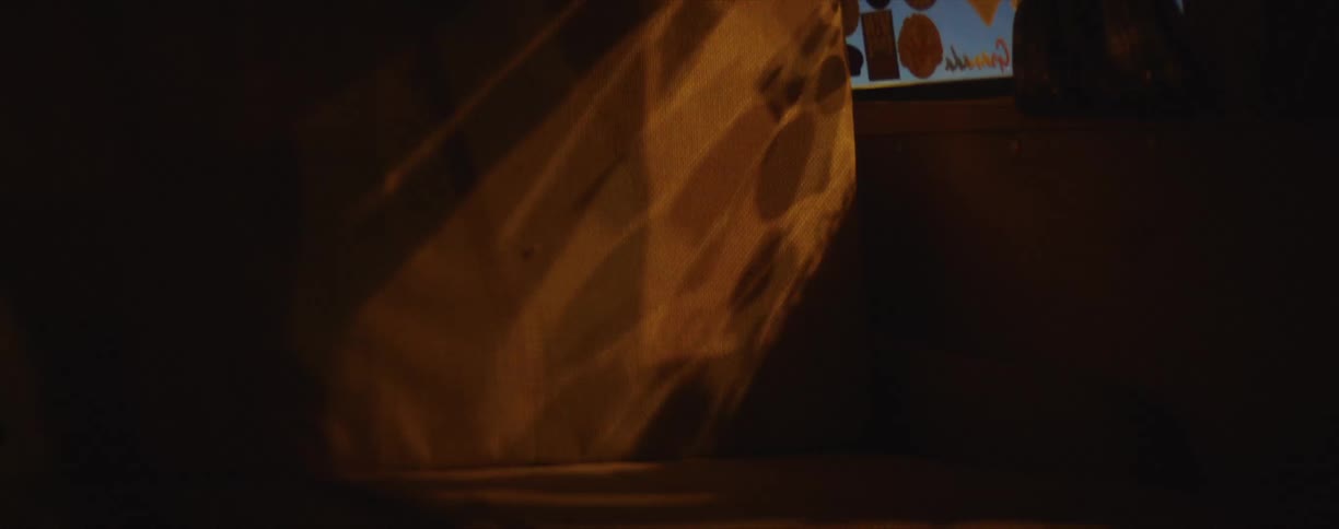 Light shining through a car window onto the seat at night