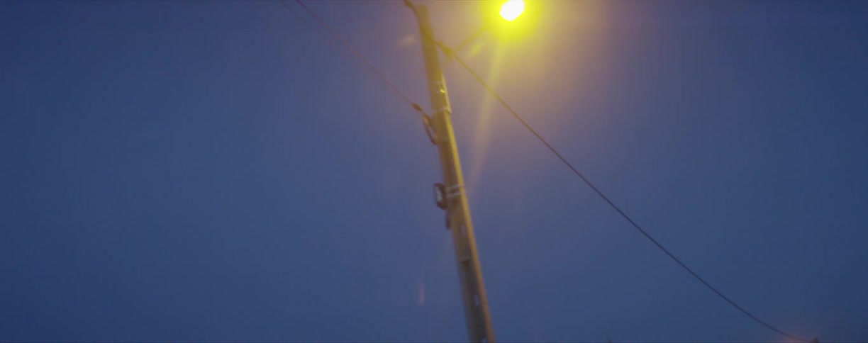 Yellow light from street lamps at evening on a rural area
