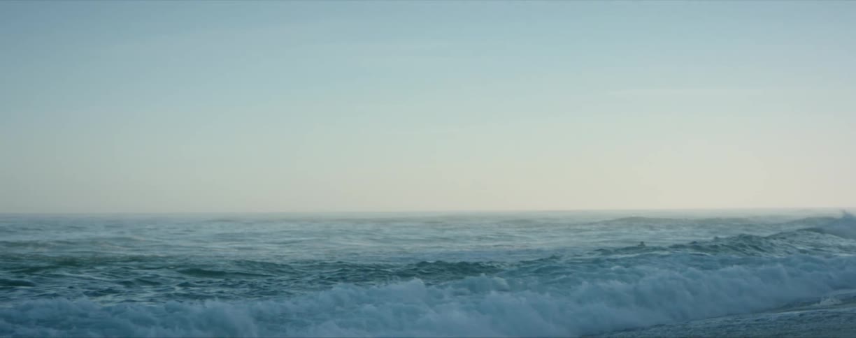 People are surfing in the rough water